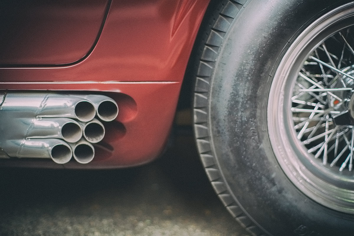 Vintage red Ferrari 500 Spyder Americano Superfast six tip side exhaust