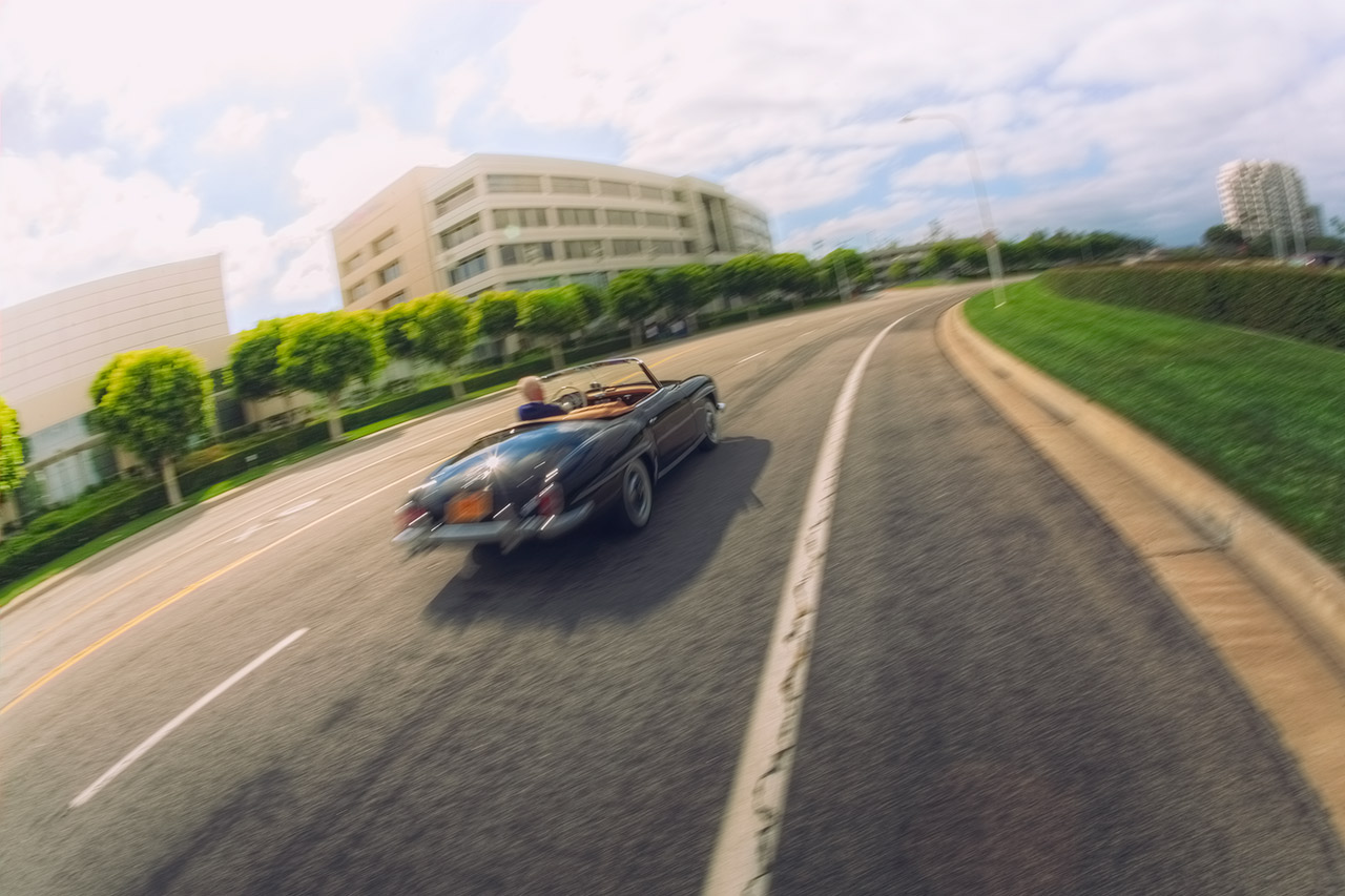 Morning drive in southern California in a classic black Mercedes 190SL roadster