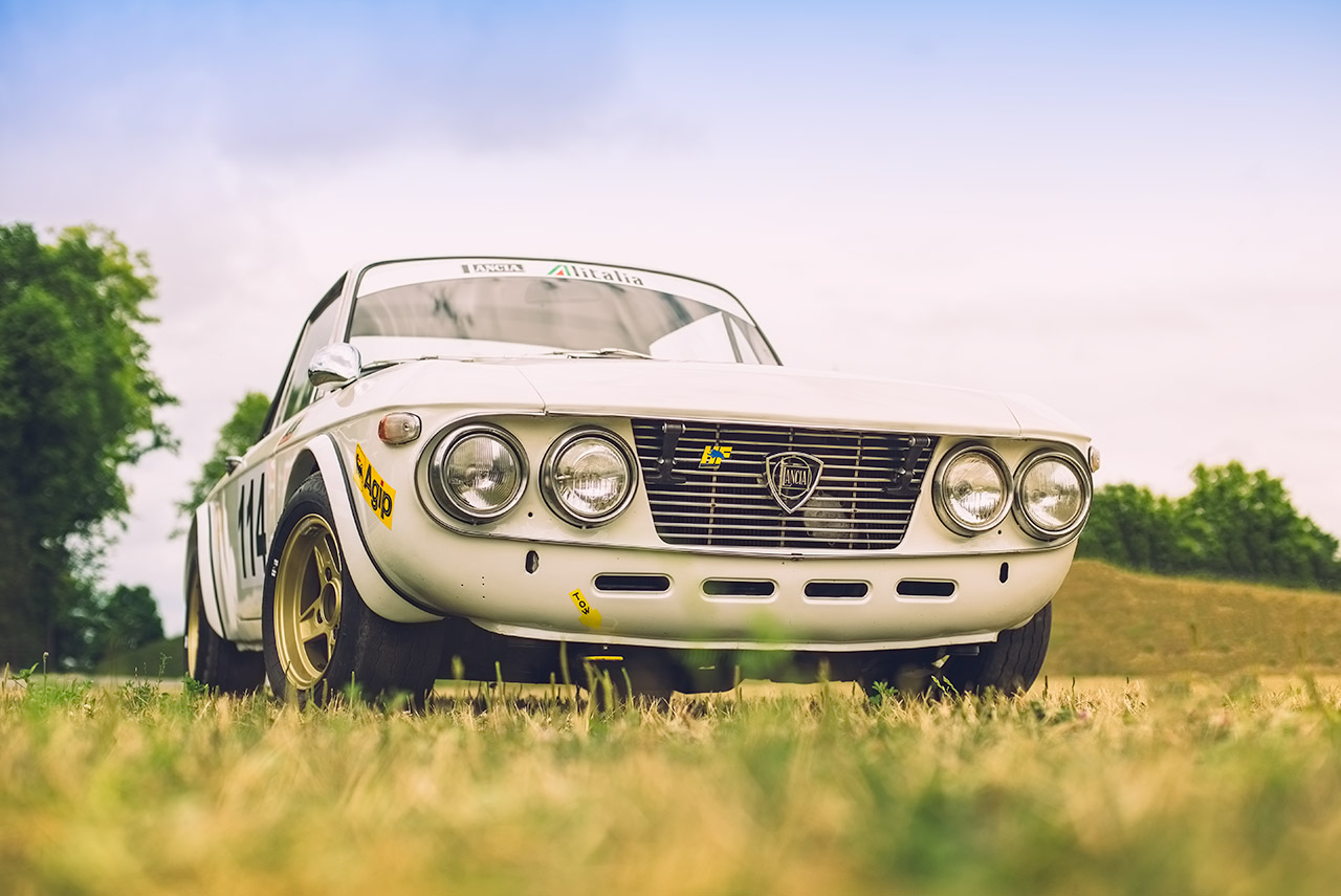 White classic Lancia Fulvia HF rally car