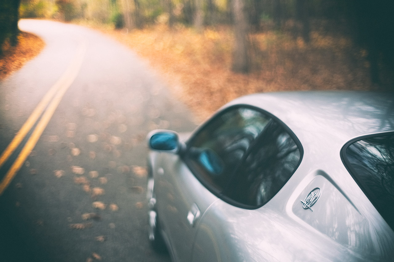 Late fall drive in a grigio touring Maserati Coupe GT
