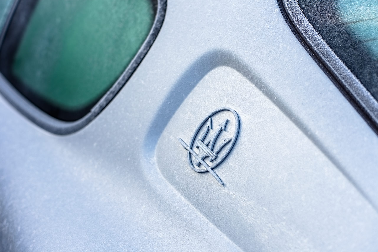 Grigio Touring Maserati Coupe on a frosty winter morning