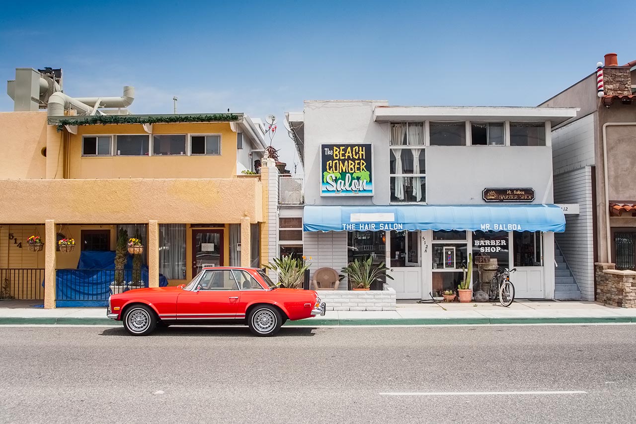 Vintage red Mercedes 280 SL in Newport Beach, California