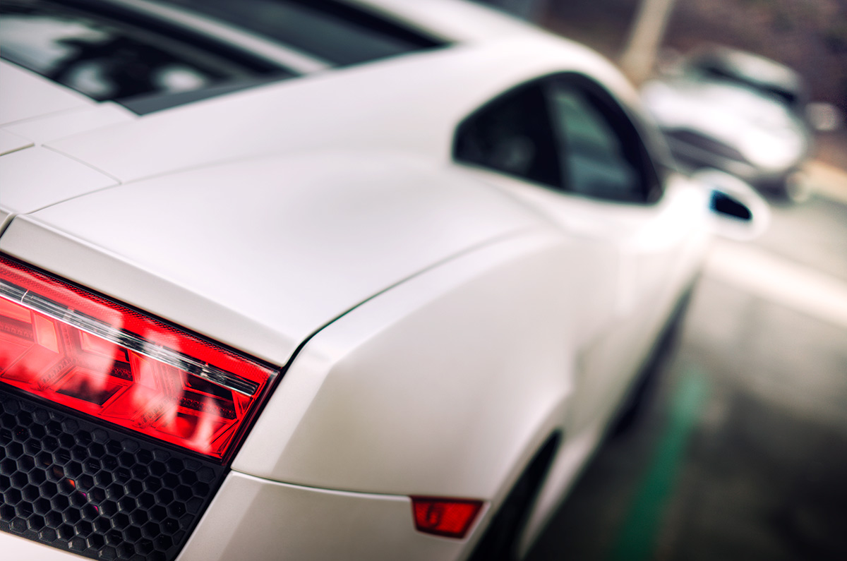 Face Off Lamborghini Gallardo and Aston Martin car photo from Burbbble